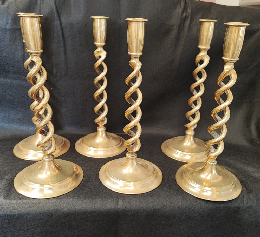 Superb set of 6 matching brass candlesticks.