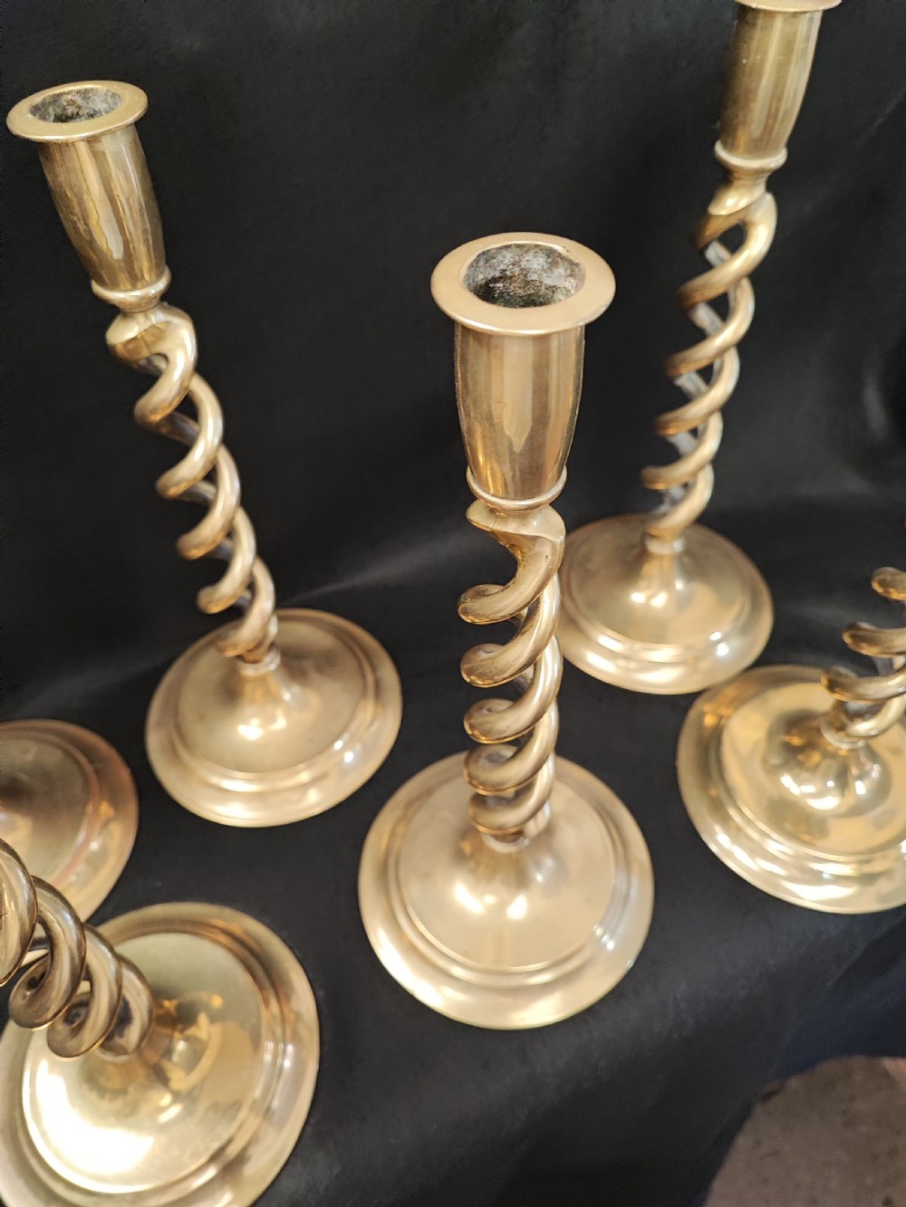 Superb set of 6 matching brass candlesticks. View V