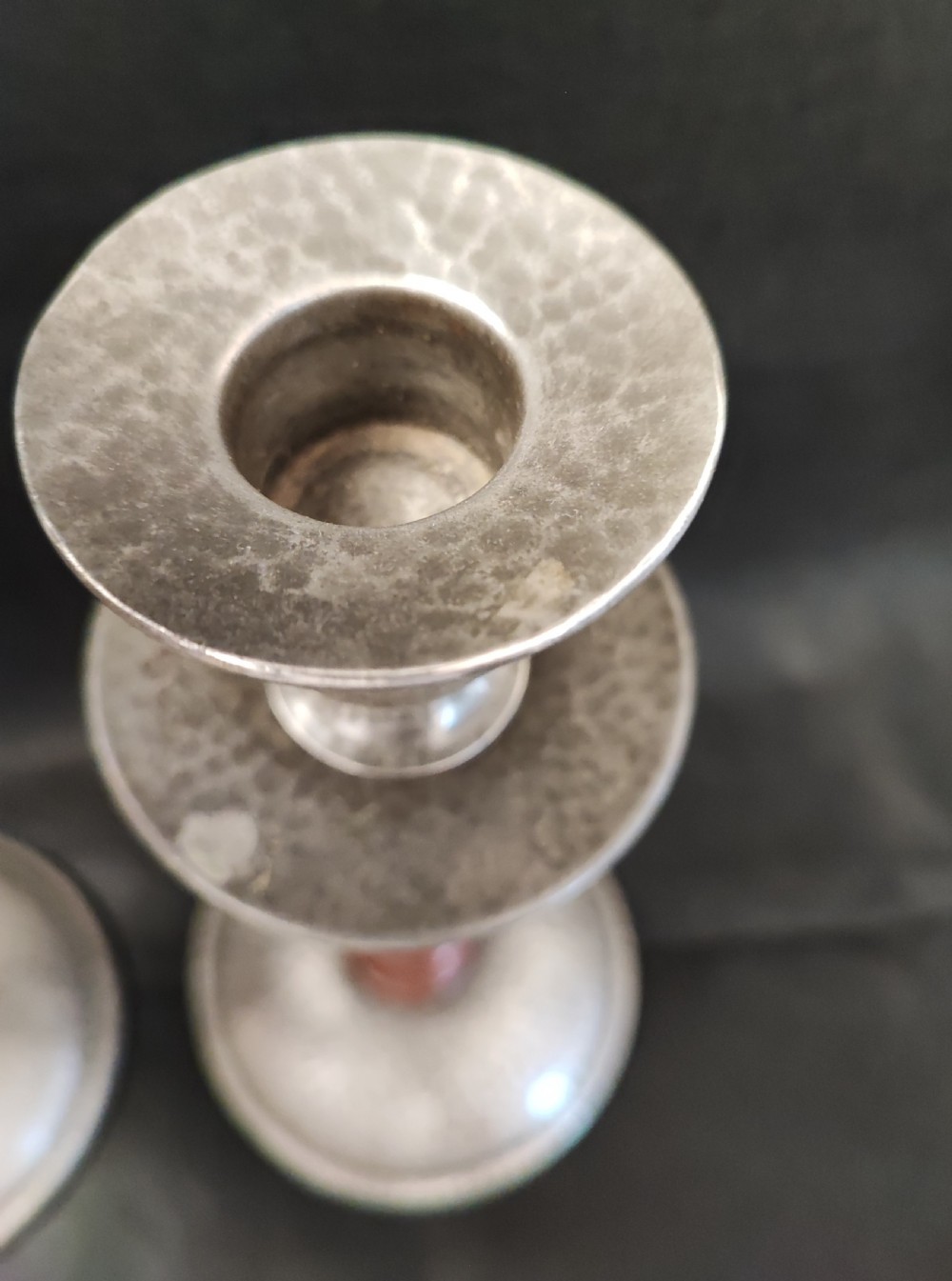A liberty's style pair of pewter and oak candlesticks. View V