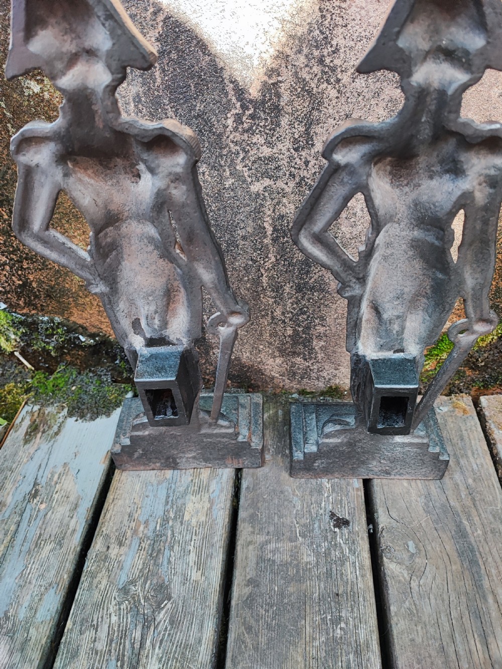 A pair of cast iron Victorian doorstops depicted as military officers in full uniform standing on stepped bases. View III