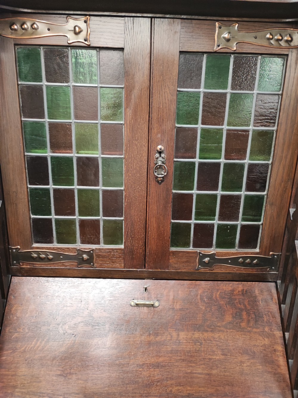 Fine example of an art's and crafts oak bureau bookcase. View V