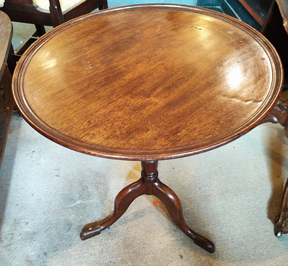 Antique mahogany circular lamp or wine table.