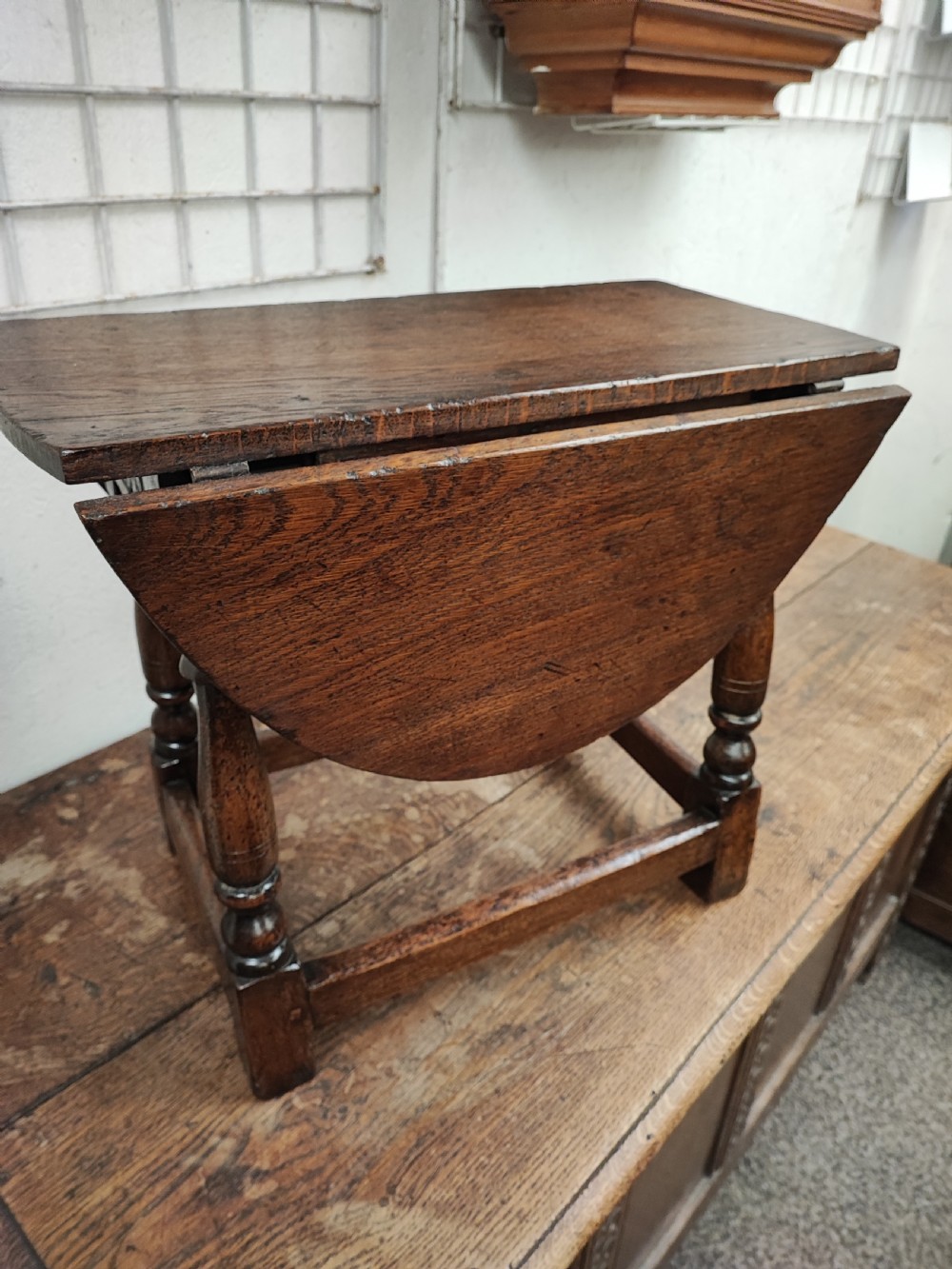 Antique oak drop flap coffee table.