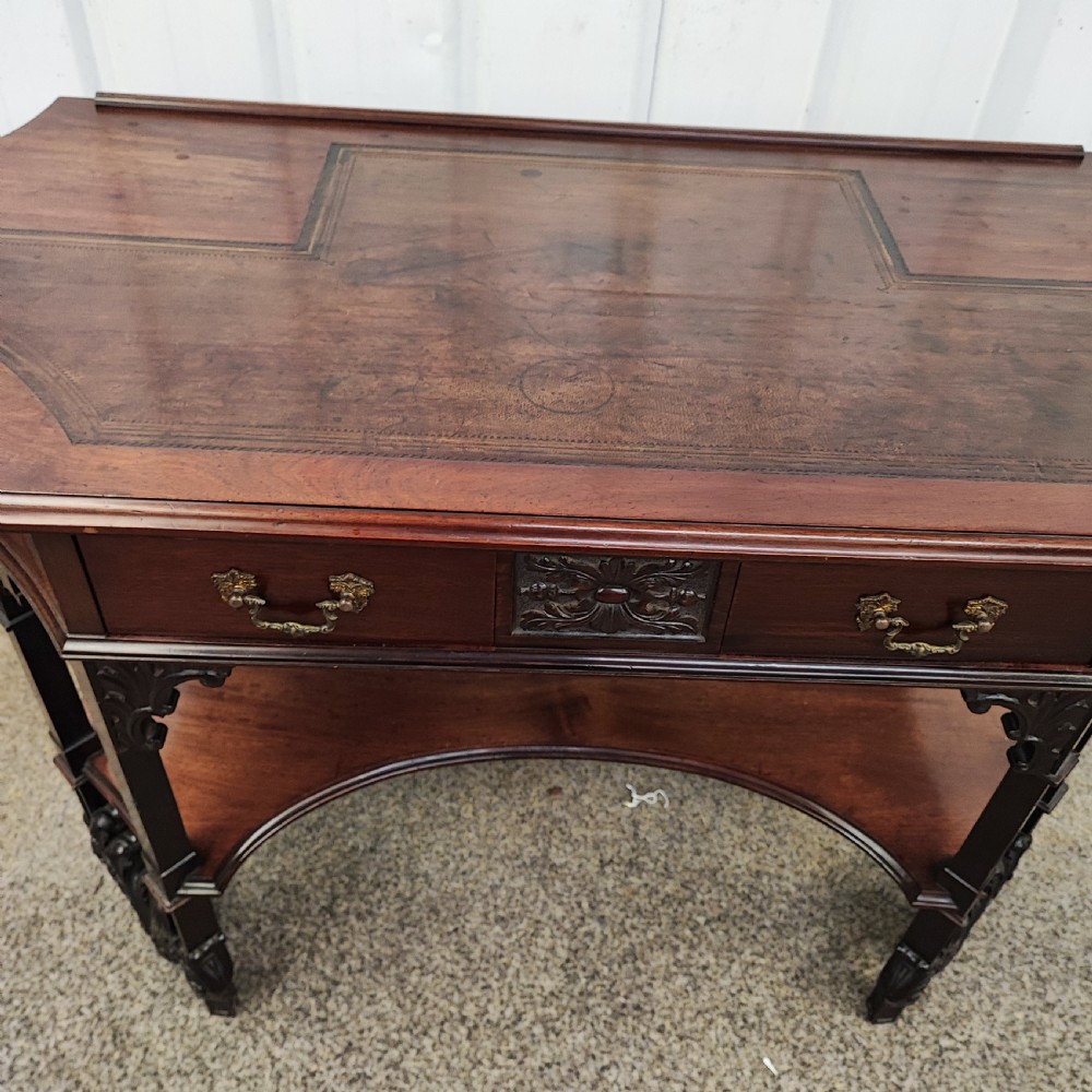 Superb19c carved mahogany writing table View II