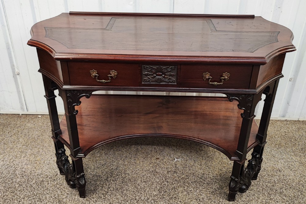 Superb19c carved mahogany writing table View IV