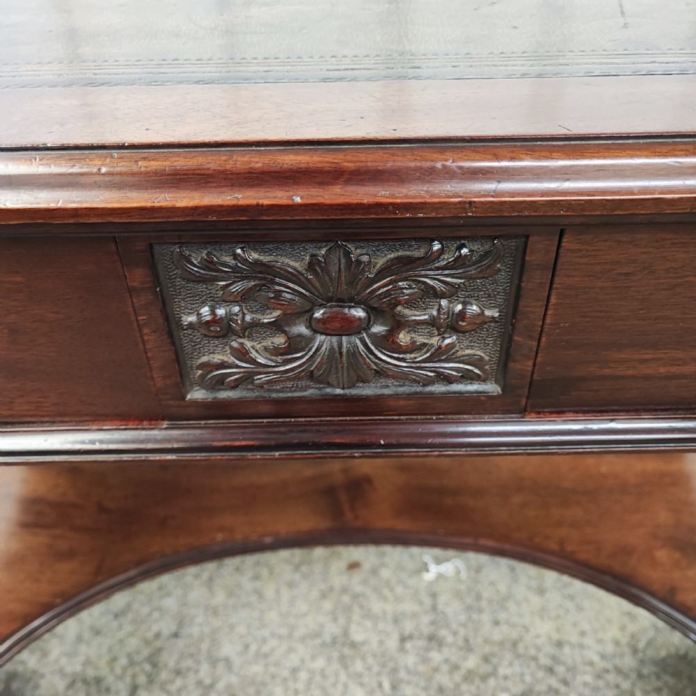 Superb19c carved mahogany writing table View XII