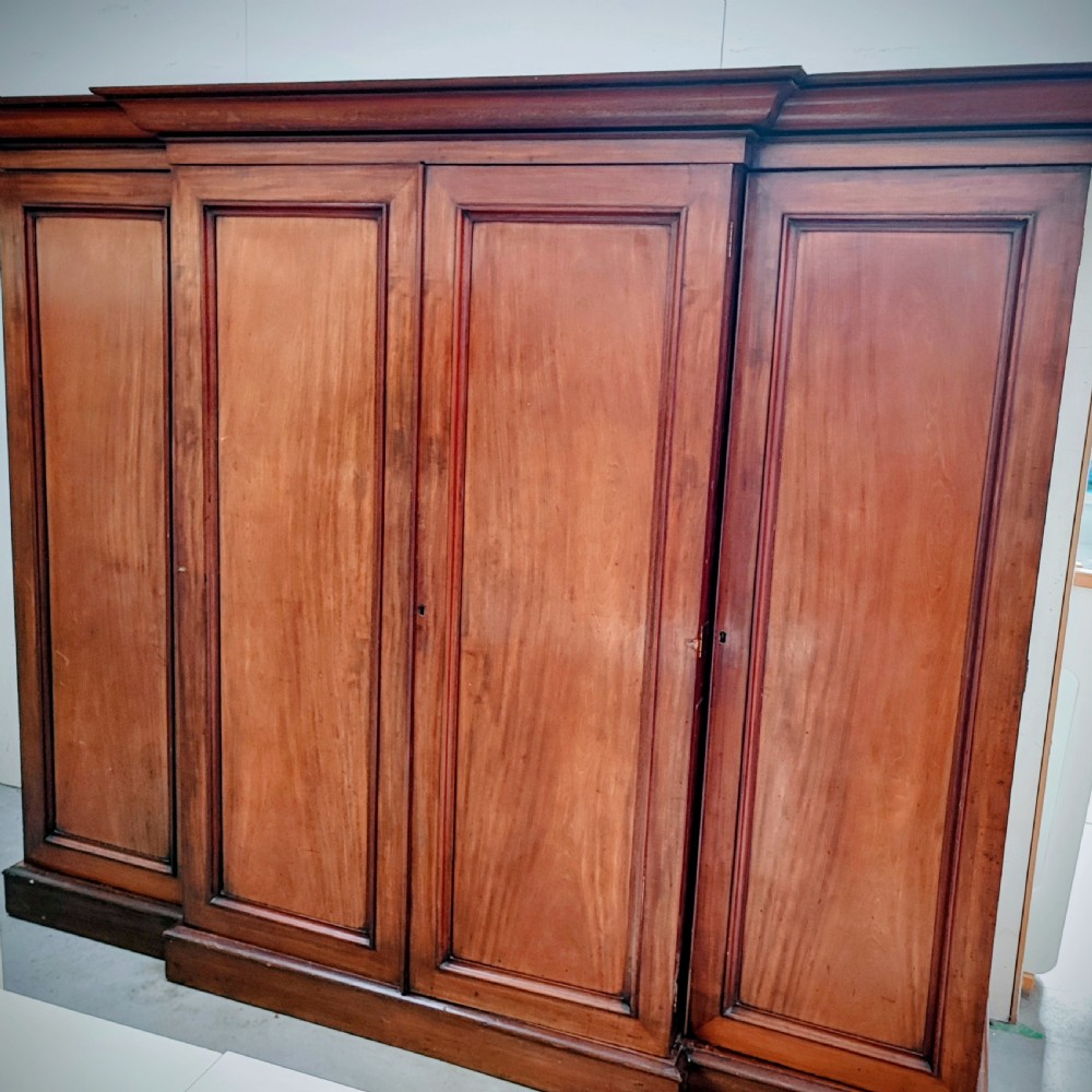 Superb Regency mahogany four door breakfront wardrobe