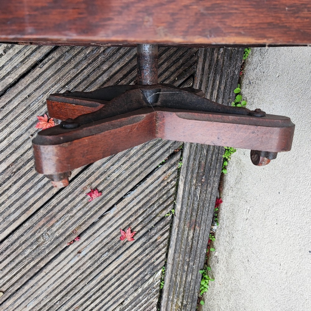 Fine Edwardian oak revolving bookcase View VI