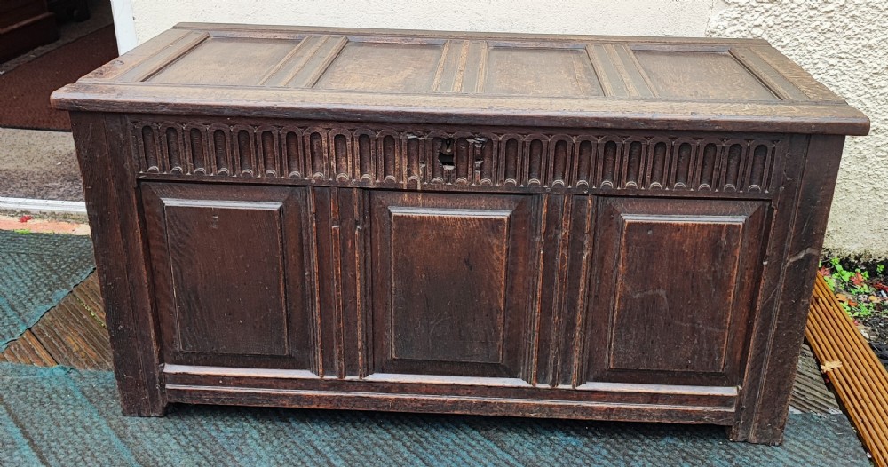 18c oak carved and panelled oak coffer