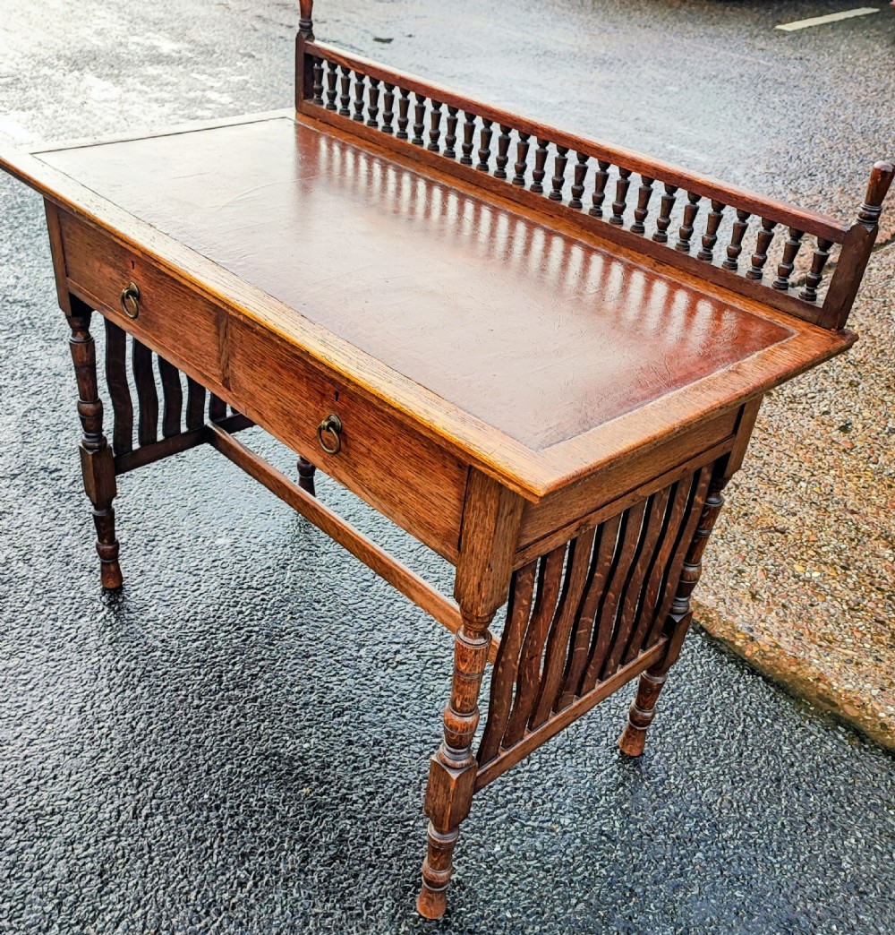 Liberty of London    oak arts and crafts writing table 