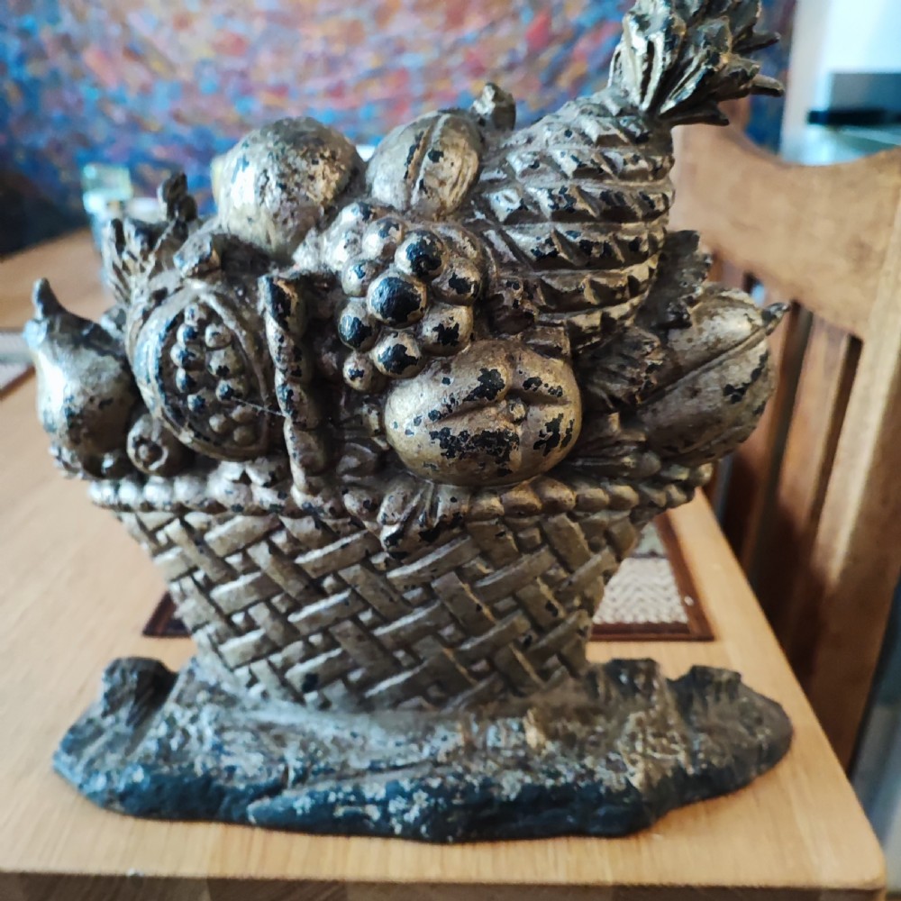 Antique silvered cast iron door stop