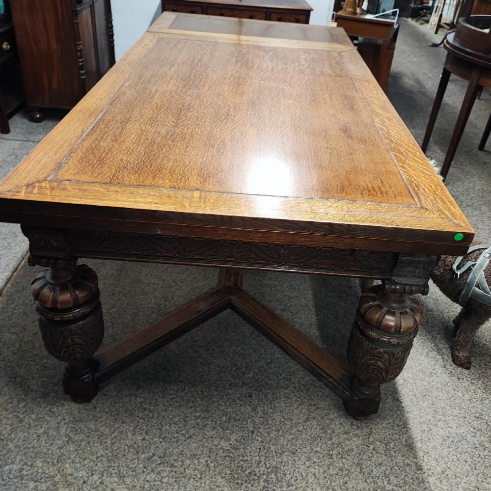 Superb oak dining table and 8 matching chairs View VIII