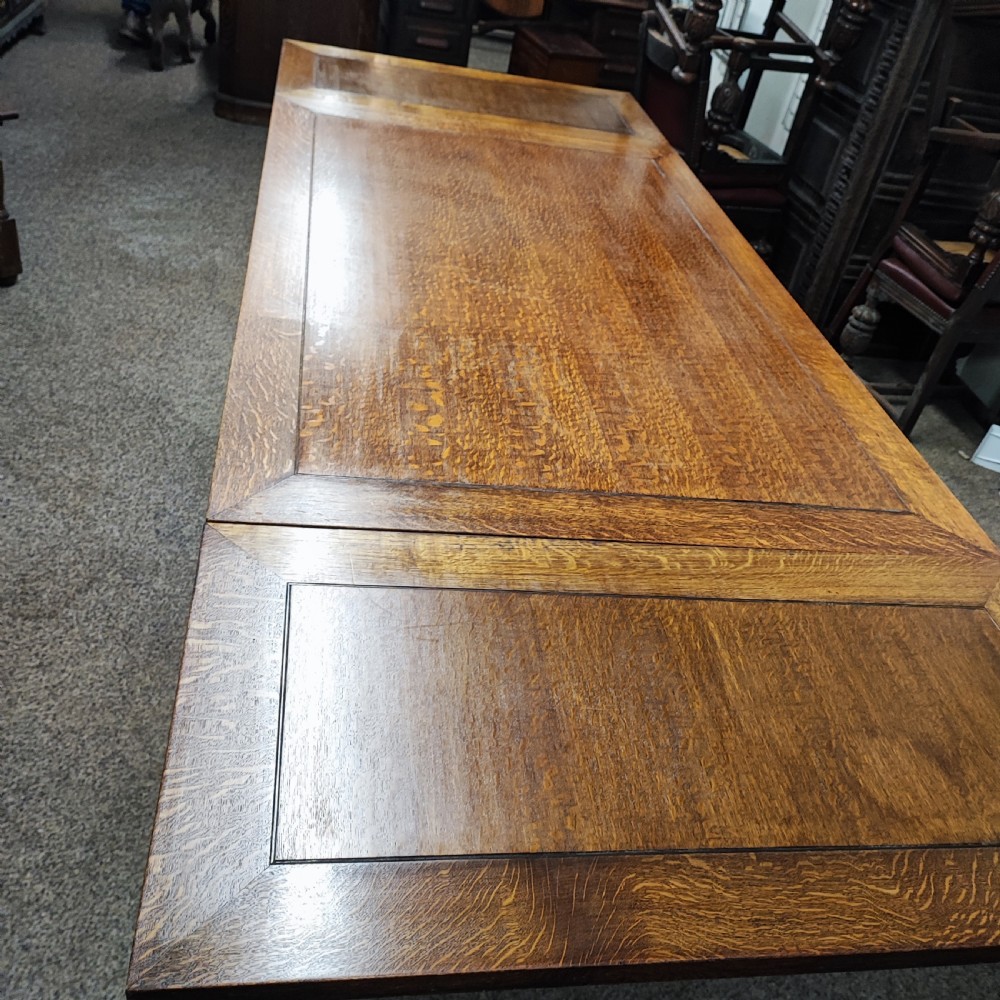 Superb oak dining table and 8 matching chairs View IX