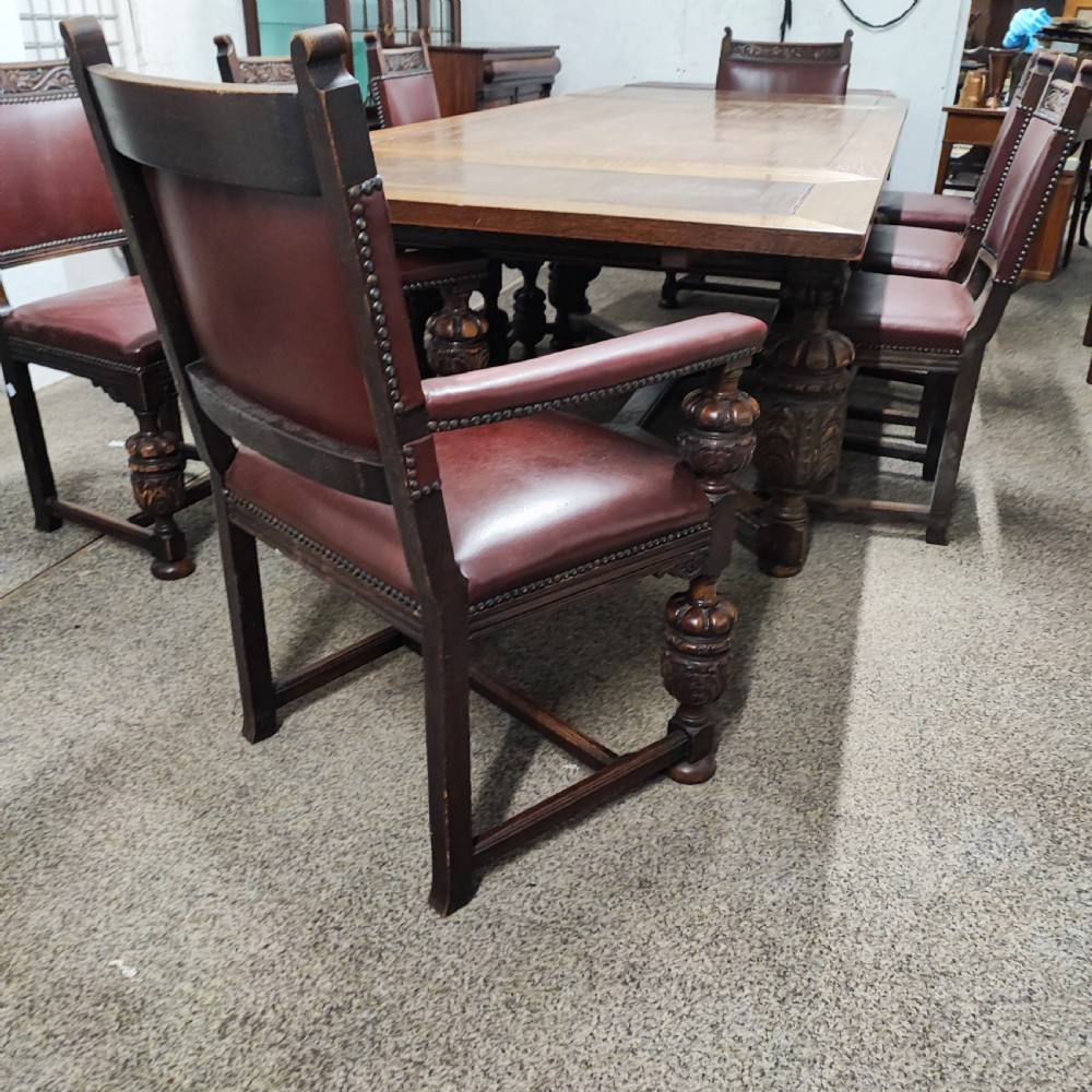 Superb oak dining table and 8 matching chairs View X