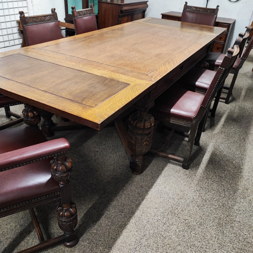 Superb oak dining table and 8 matching chairs View XI