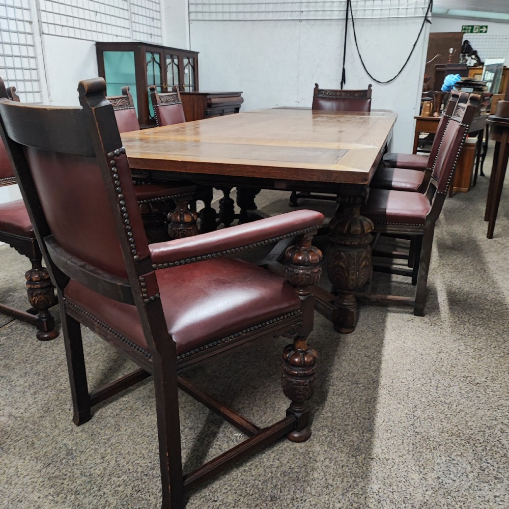 Superb oak dining table and 8 matching chairs View XII