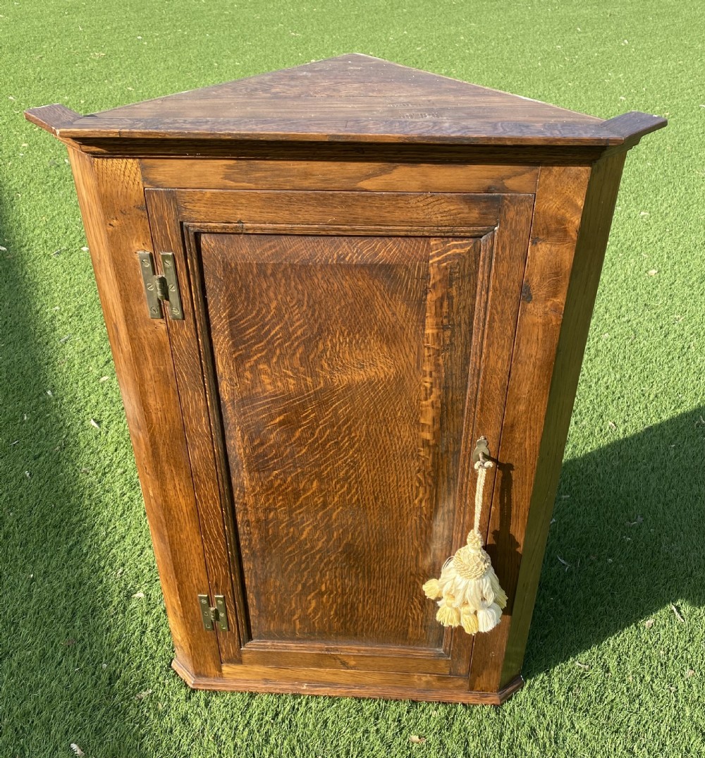 Oak corner cupboard