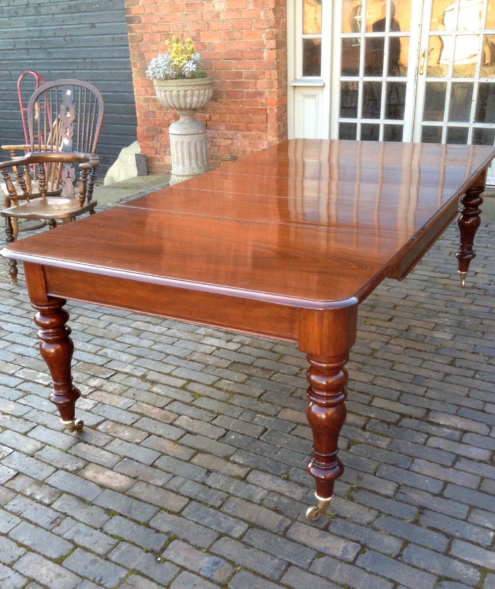 Nineteenth Century Mahogany Pull Out Dining Table