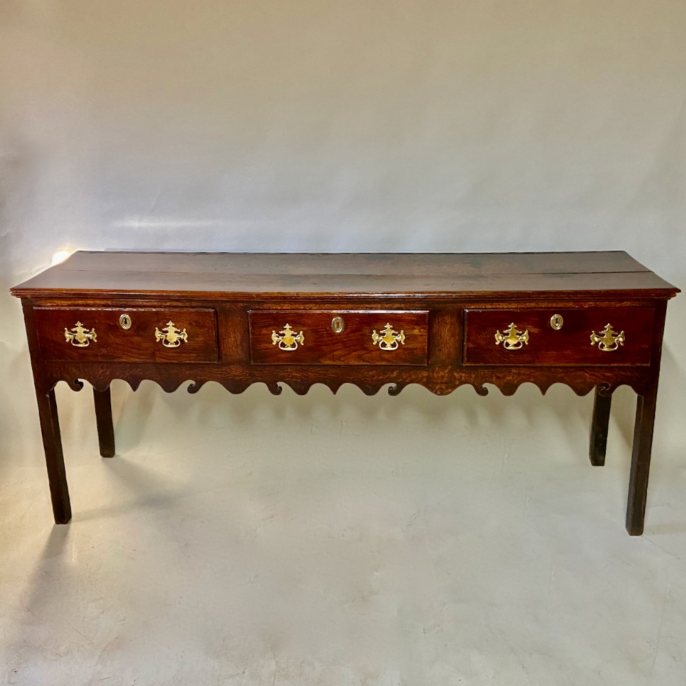 Eighteenth century oak low dresser.