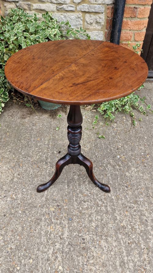 A Georgian  Fruitwood wine table tilt top. 