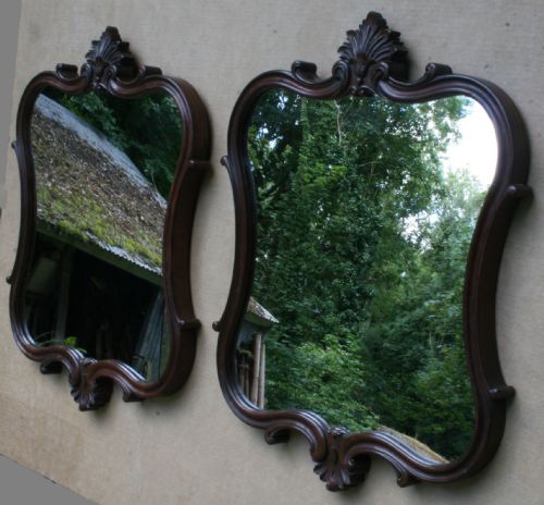 A PAIR OF MID VICTORIAN ROSEWOOD FRAMED WALL MIRRORS - ADDITIONAL PHOTO 1