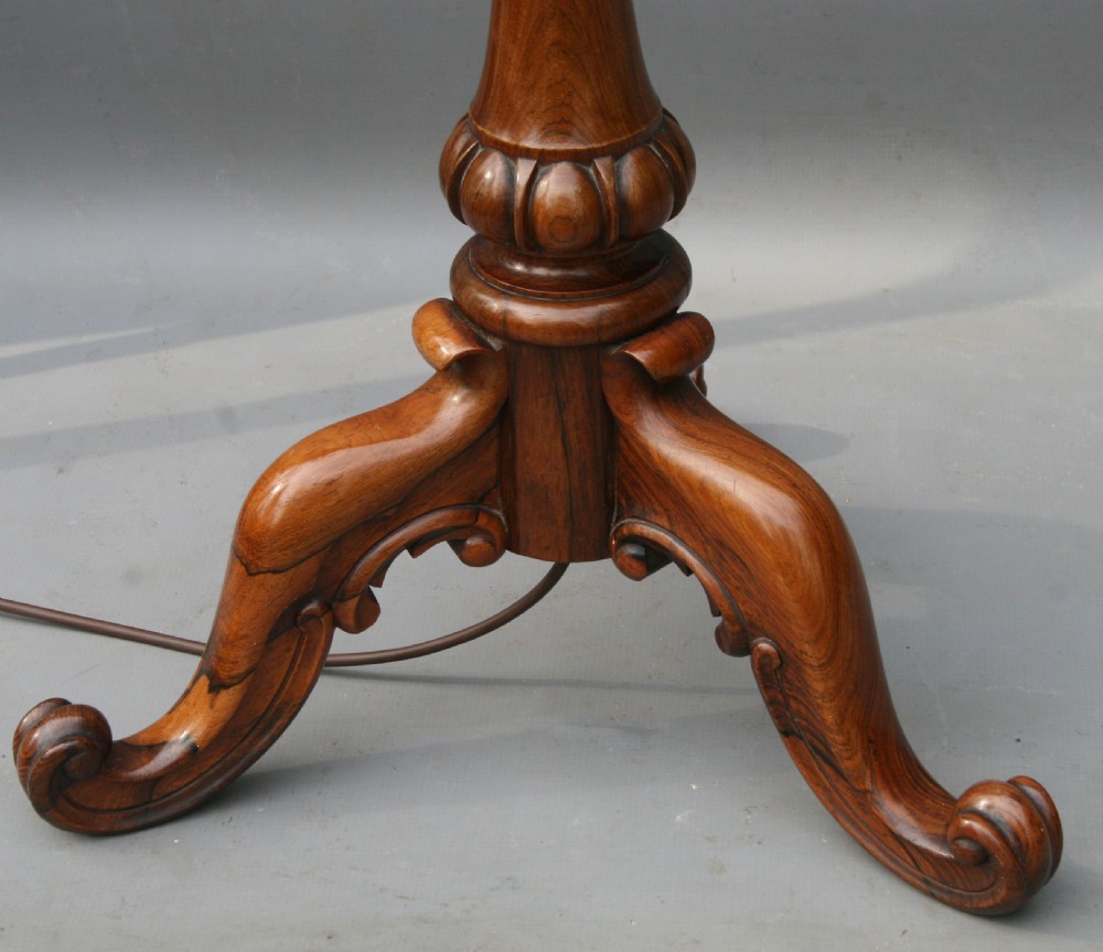 An antique William IV rosewood standard lamp with carved tripod scroll legs, a slender brass stem, and a beige hexagonal fabric shade. View III