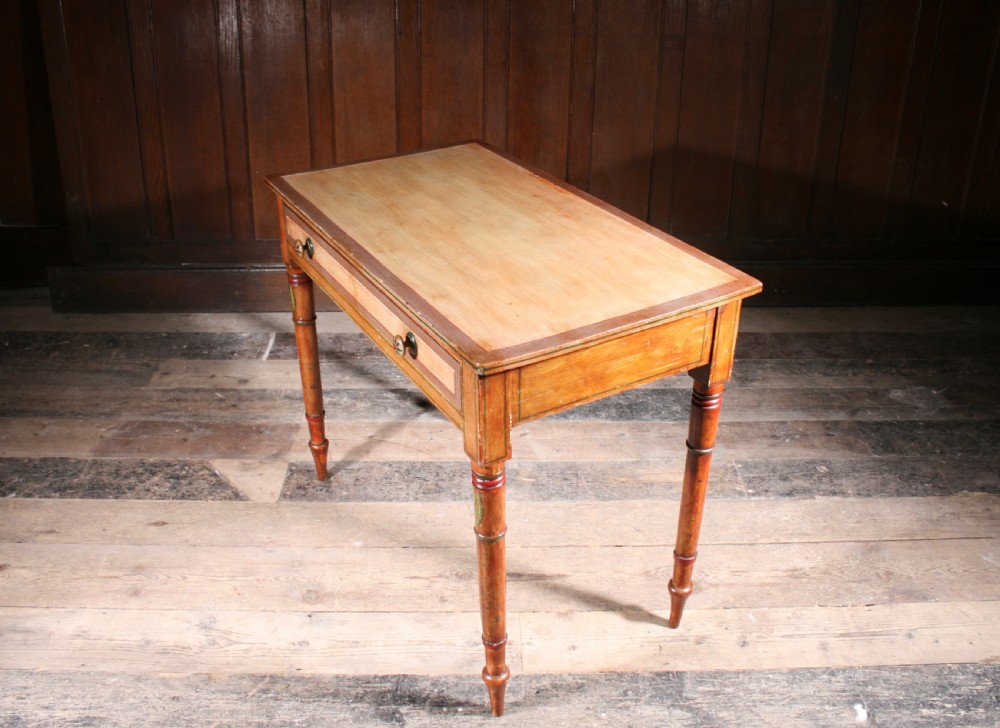 A late Georgian painted pine side table featuring a single drawer with two round knobs and slender turned legs decorated with painted details. View III