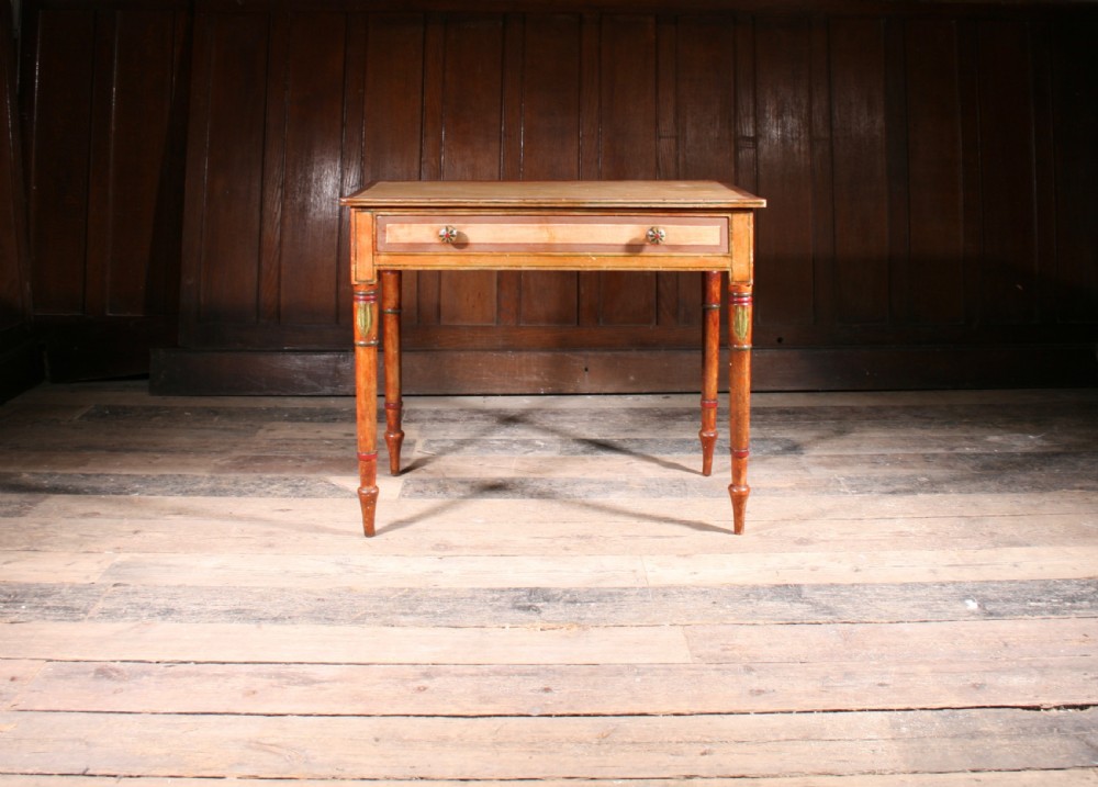 A late Georgian painted pine side table featuring a single drawer with two round knobs and slender turned legs decorated with painted details. View IV