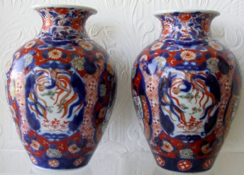 Harlequin Pair of Antique Japanese Meiji Period Imari Vases