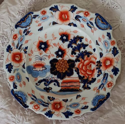 fig 1. Set of six scalloped antique ironstone plates decorated with cobalt blue and terracotta floral Imari patterns with gilded details.