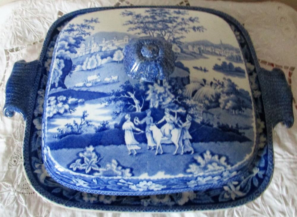 A square antique blue and white transferware vegetable tureen and cover decorated with a classical Europa pattern landscape scene.