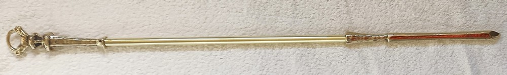 A three-piece set of Victorian brass fire irons comprising a poker, a shovel with a pierced scroll blade, and a pair of decorative tongs. View VII