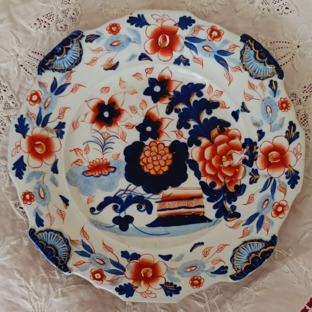Set of six scalloped antique ironstone plates decorated with cobalt blue and terracotta floral Imari patterns with gilded details. View VI