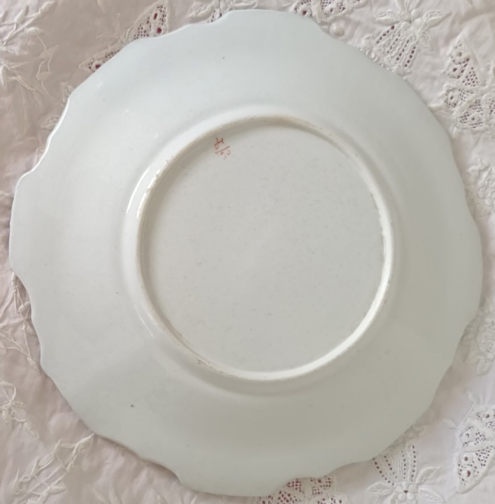 Set of six scalloped antique ironstone plates decorated with cobalt blue and terracotta floral Imari patterns with gilded details. View IX