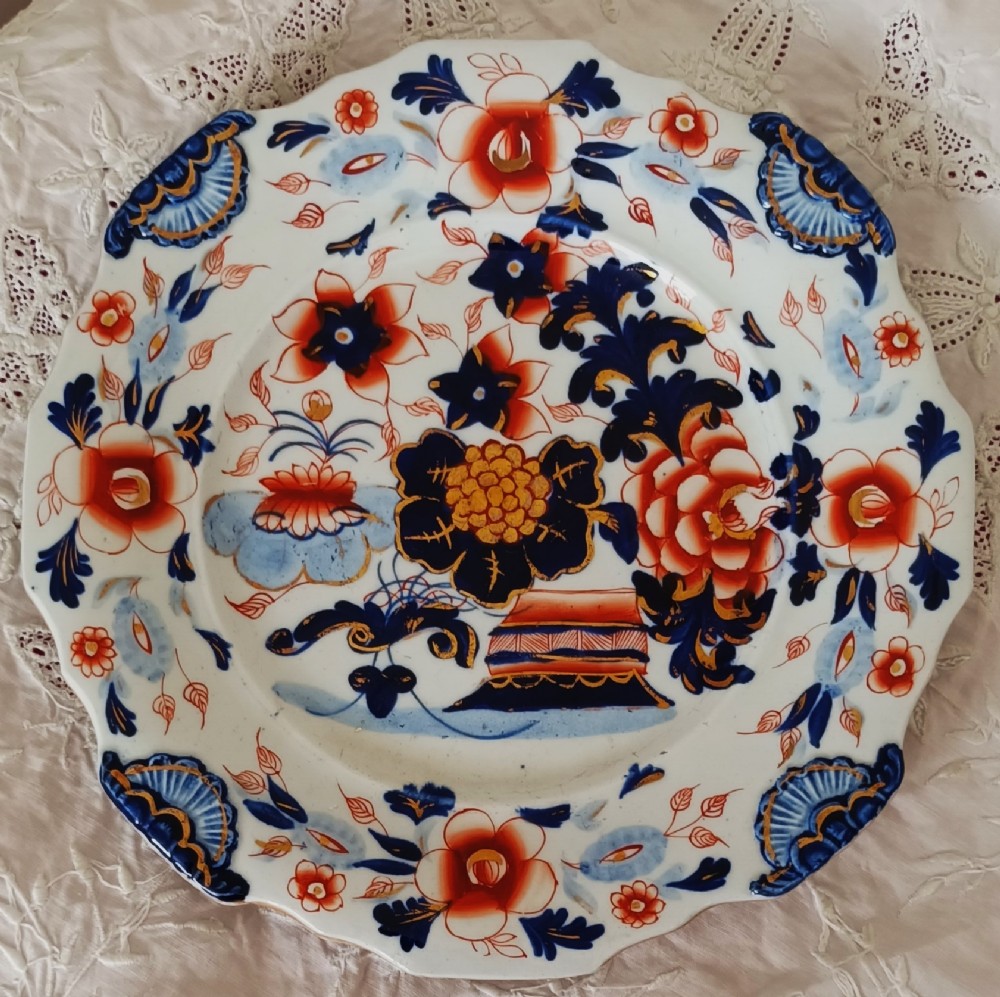 Set of six scalloped antique ironstone plates decorated with cobalt blue and terracotta floral Imari patterns with gilded details. View X