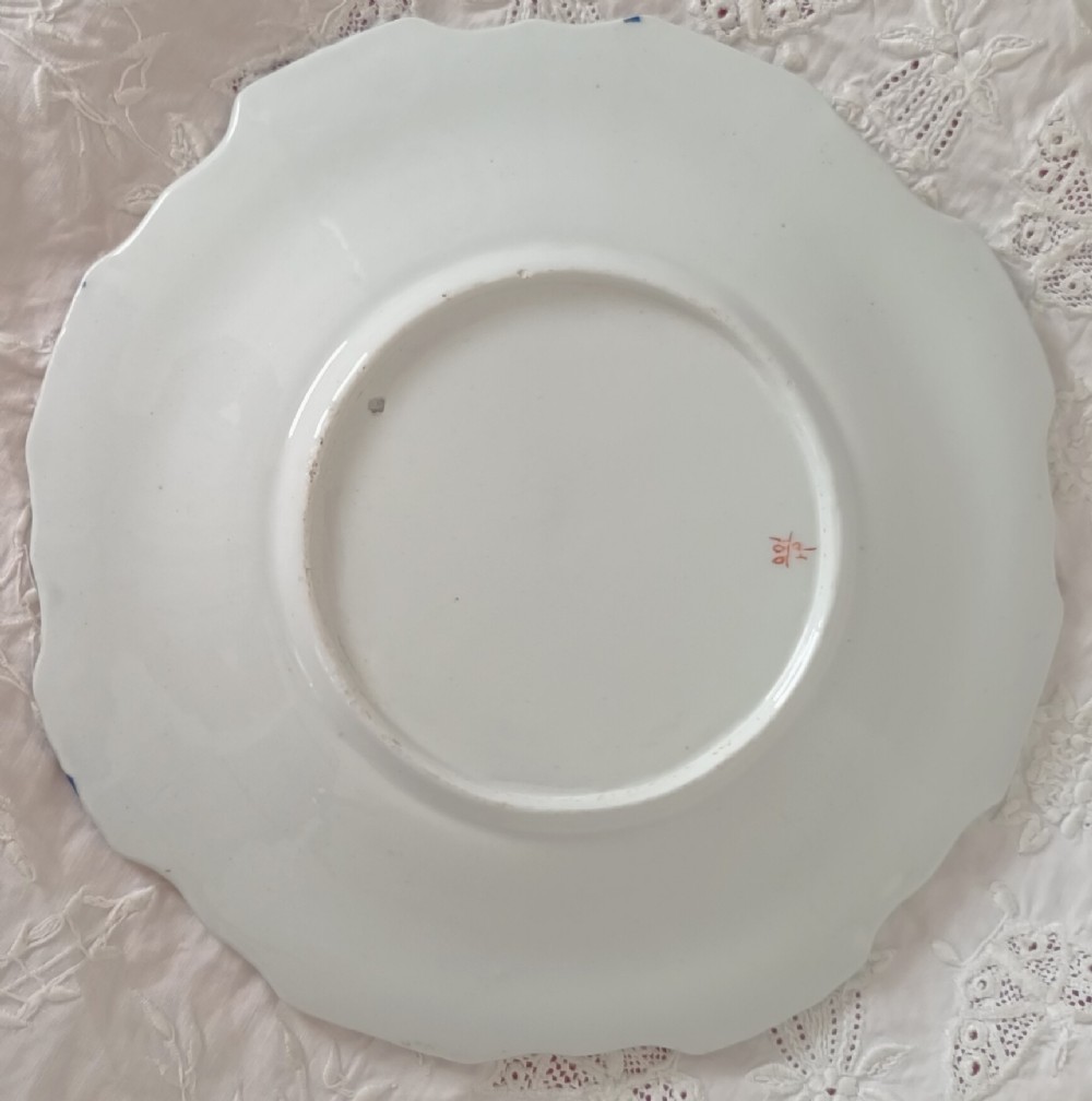 Set of six scalloped antique ironstone plates decorated with cobalt blue and terracotta floral Imari patterns with gilded details. View XIII