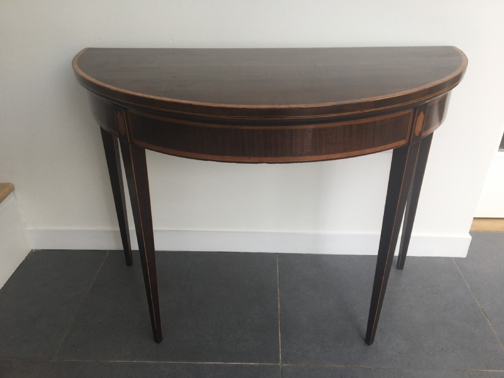 Early 19thC mahogany demi lune folding card table c1820