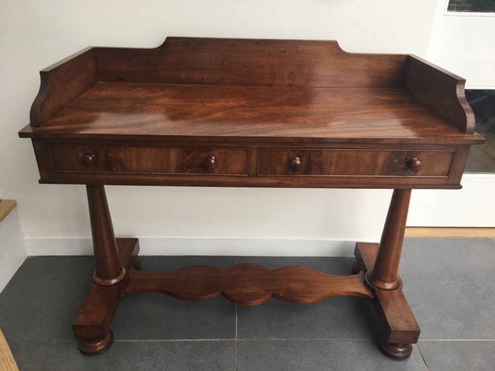 Mid 19thC mahogany side table with raised surround c1860