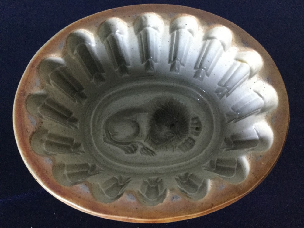 A rare Georgian era jelly mould with lion design c1800 View V