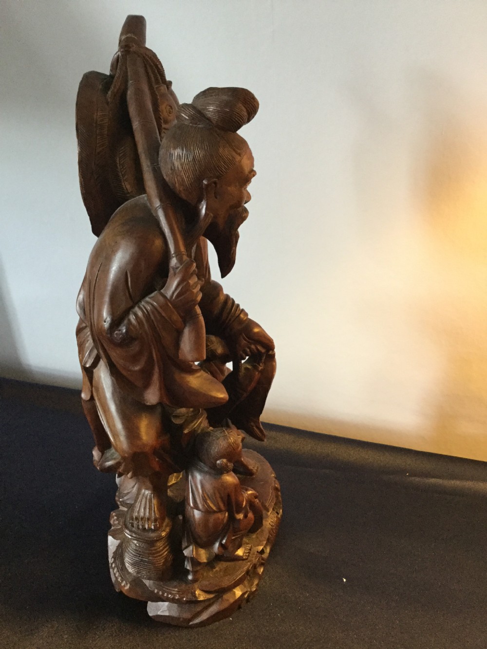 An Oriental carved hardwood group c1900 View III