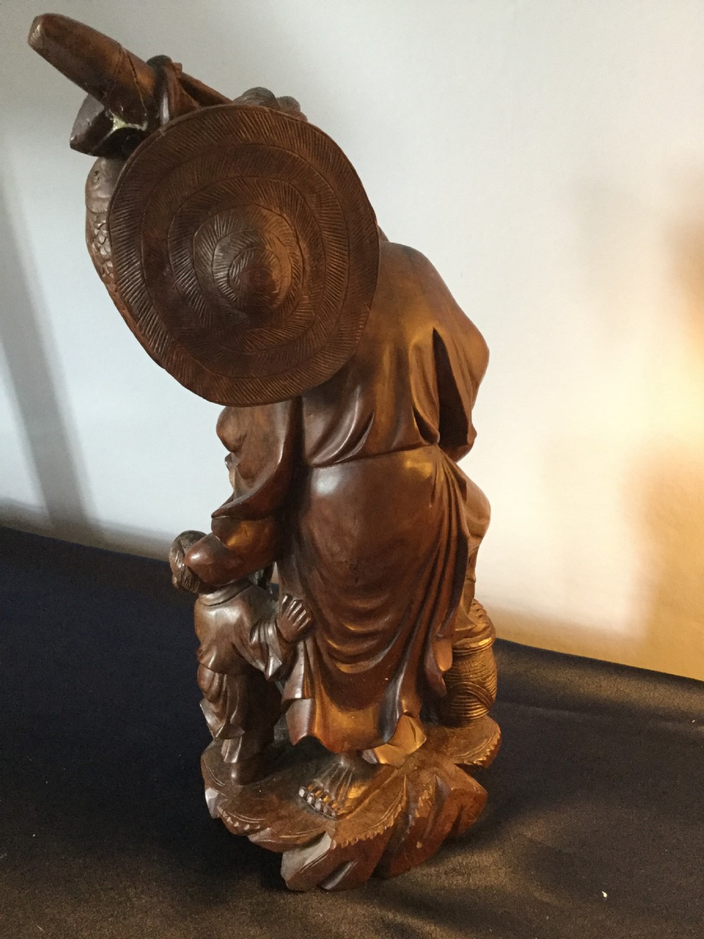 An Oriental carved hardwood group c1900 View IV