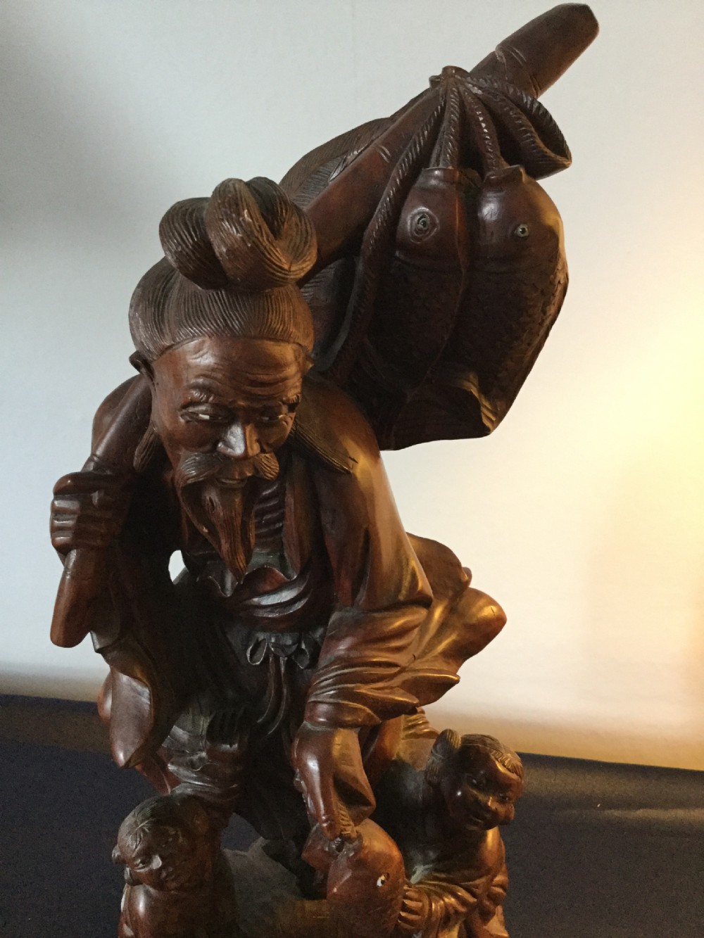 An Oriental carved hardwood group c1900 View V