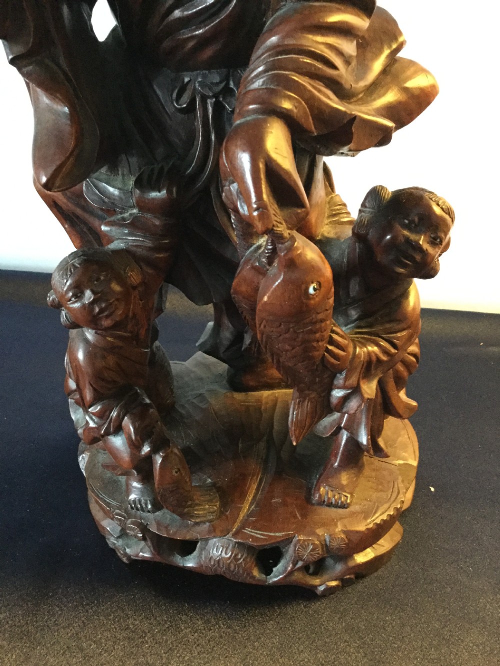 An Oriental carved hardwood group c1900 View VI