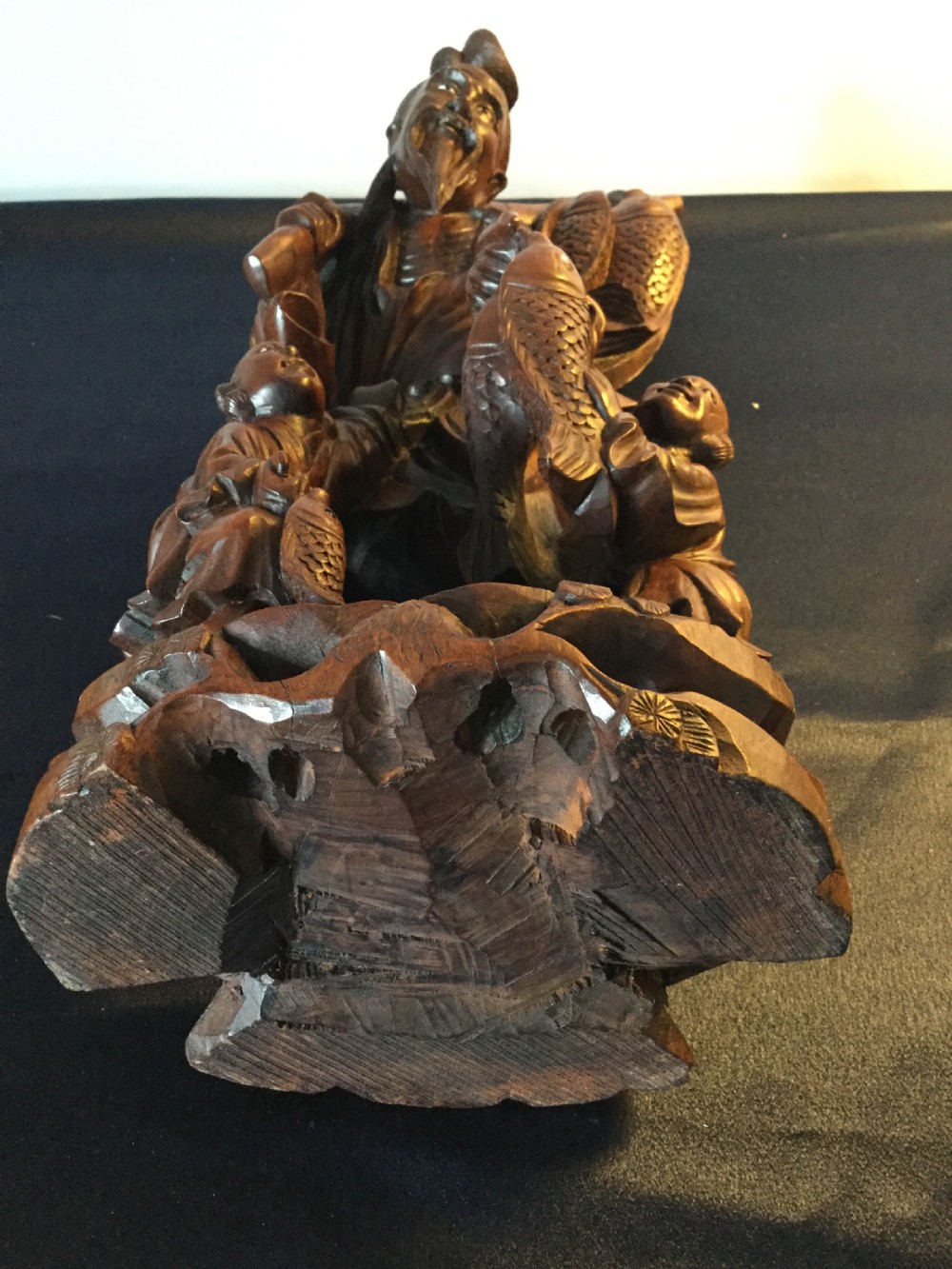 An Oriental carved hardwood group c1900 View X