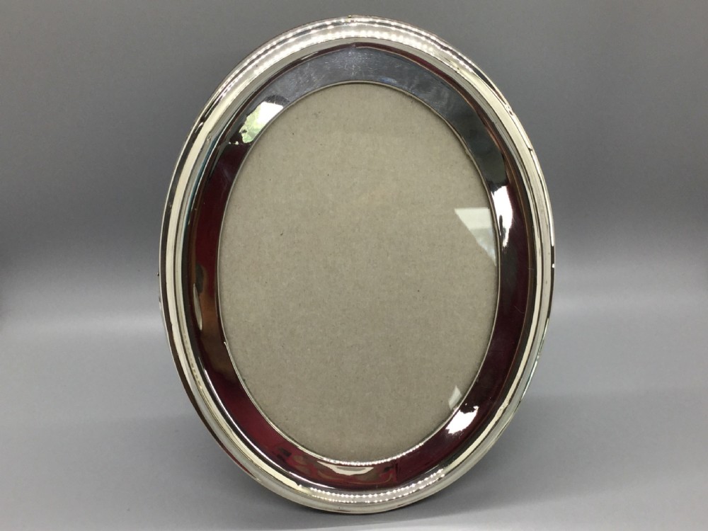 Edwardian silver oval photo frame Birmingham 1909 A & J ZIMMERMAN