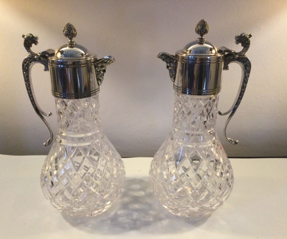 Edwardian matching pair of silver plated claret jugs c1910