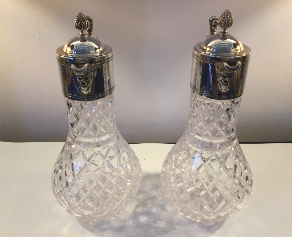 Edwardian matching pair of silver plated claret jugs c1910 View VII