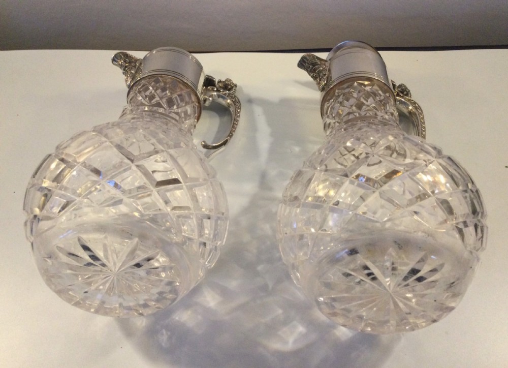 Edwardian matching pair of silver plated claret jugs c1910 View X