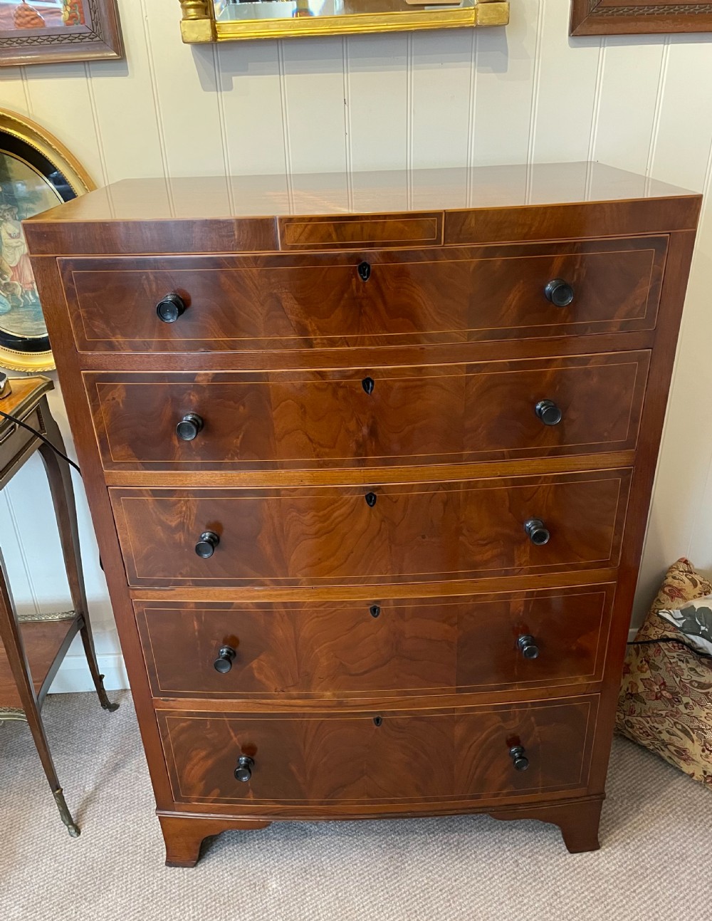 Edwardian mahogany bow front narrow chest c1910