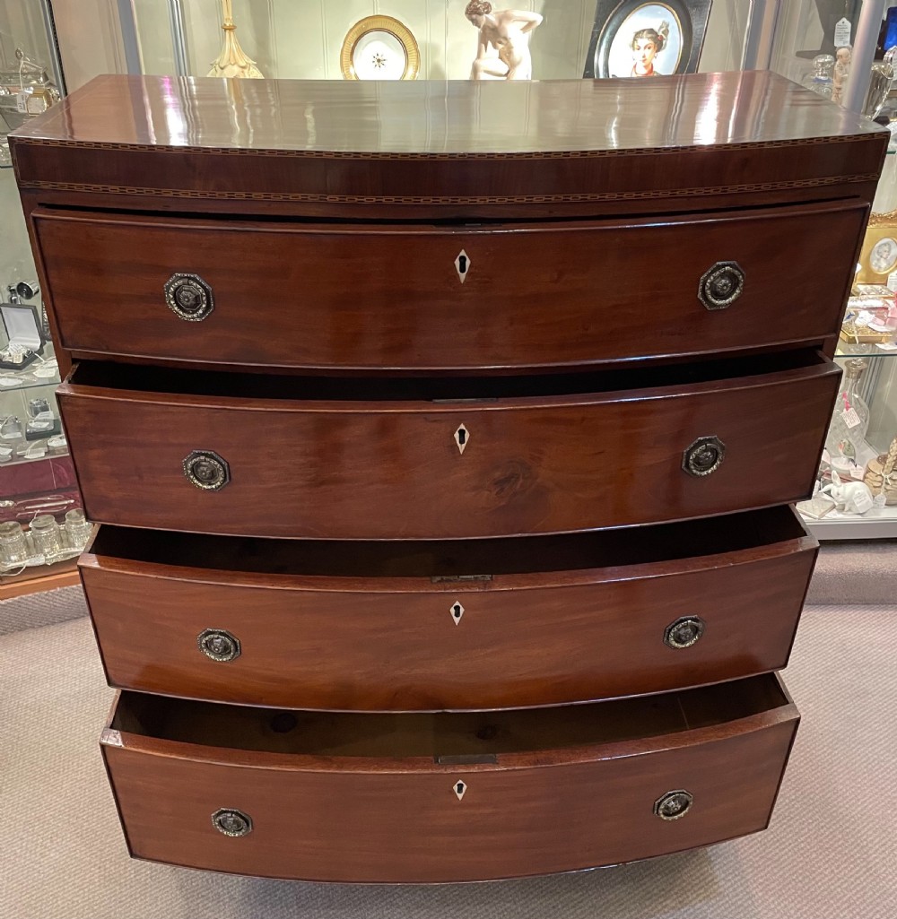 Early 19thc mahogany bow front four drawer chest c1820 View XVI